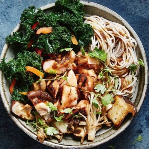 Salmon, kale and mushroom noodle bowl