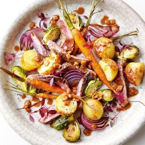 Steak and Brussels sprout salad with warm bacon dressing