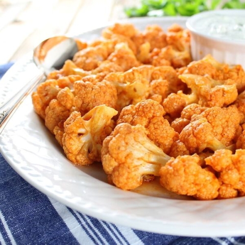 Roasted Buffalo Cauliflower with Blue Cheese Sauce