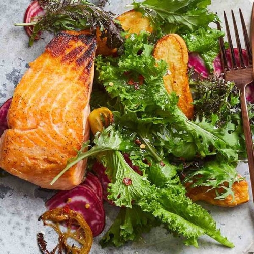 Seared Salmon With Lemons, Fingerling Potatoes, and Winter Greens