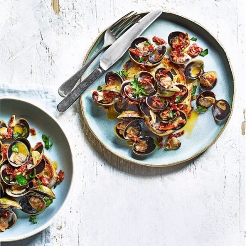 Garlic chilli clams on sourdough toast